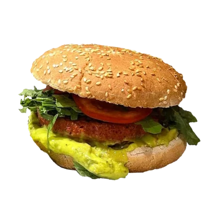 Veganer Guacamole Burger mit Pattie, Rucola, Hummus, Gurke, Tomaten und Karotten.